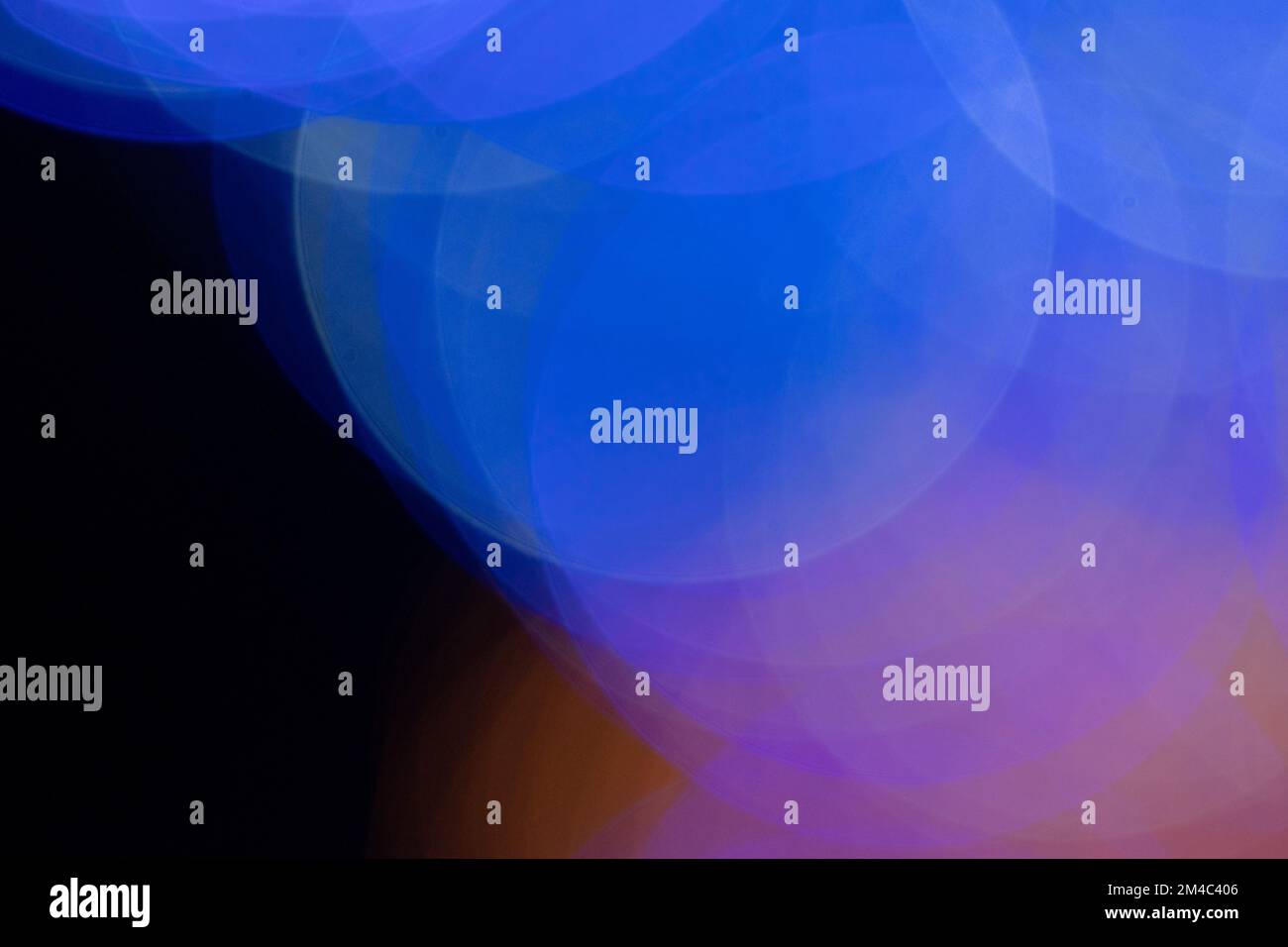 Blue Bokeh Light Background With Soft Defocused Glowing Circles Stock Photo