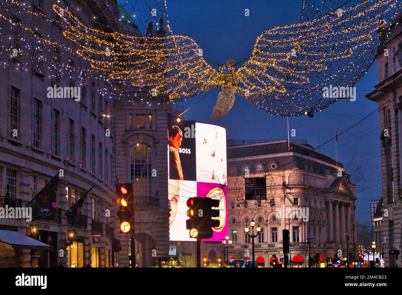 London, England, UK - Regent Street Christmas lights and Piccadilly Circus illuminated billboards Stock Photo