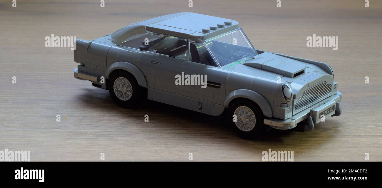 Aston Martin DB5 model car on the kitchen table in the winter of 2022 in Tatabánya, Hungary. Stock Photo