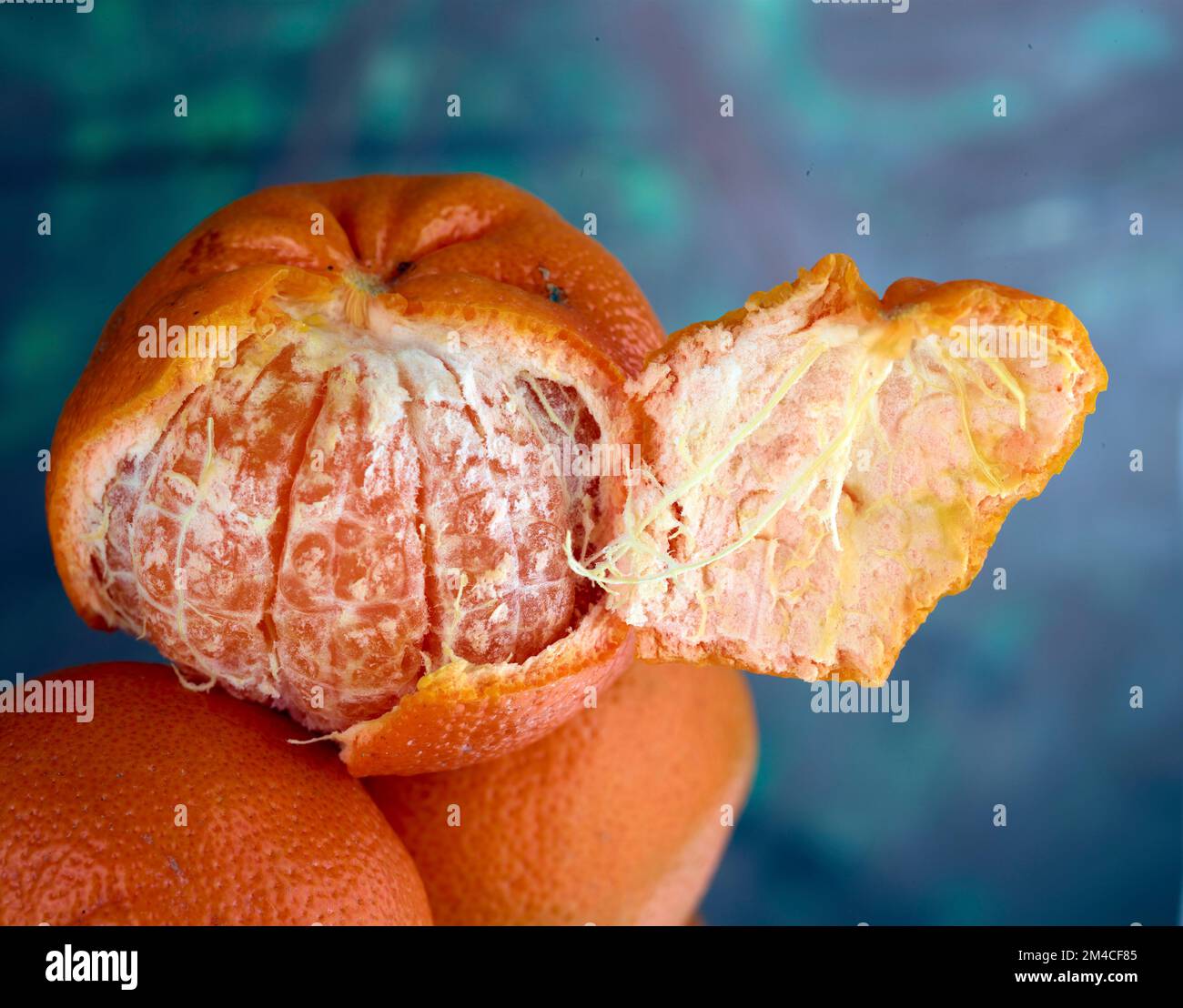 Easy peel sweet Tangerines on clean neutral background. Natural close ...