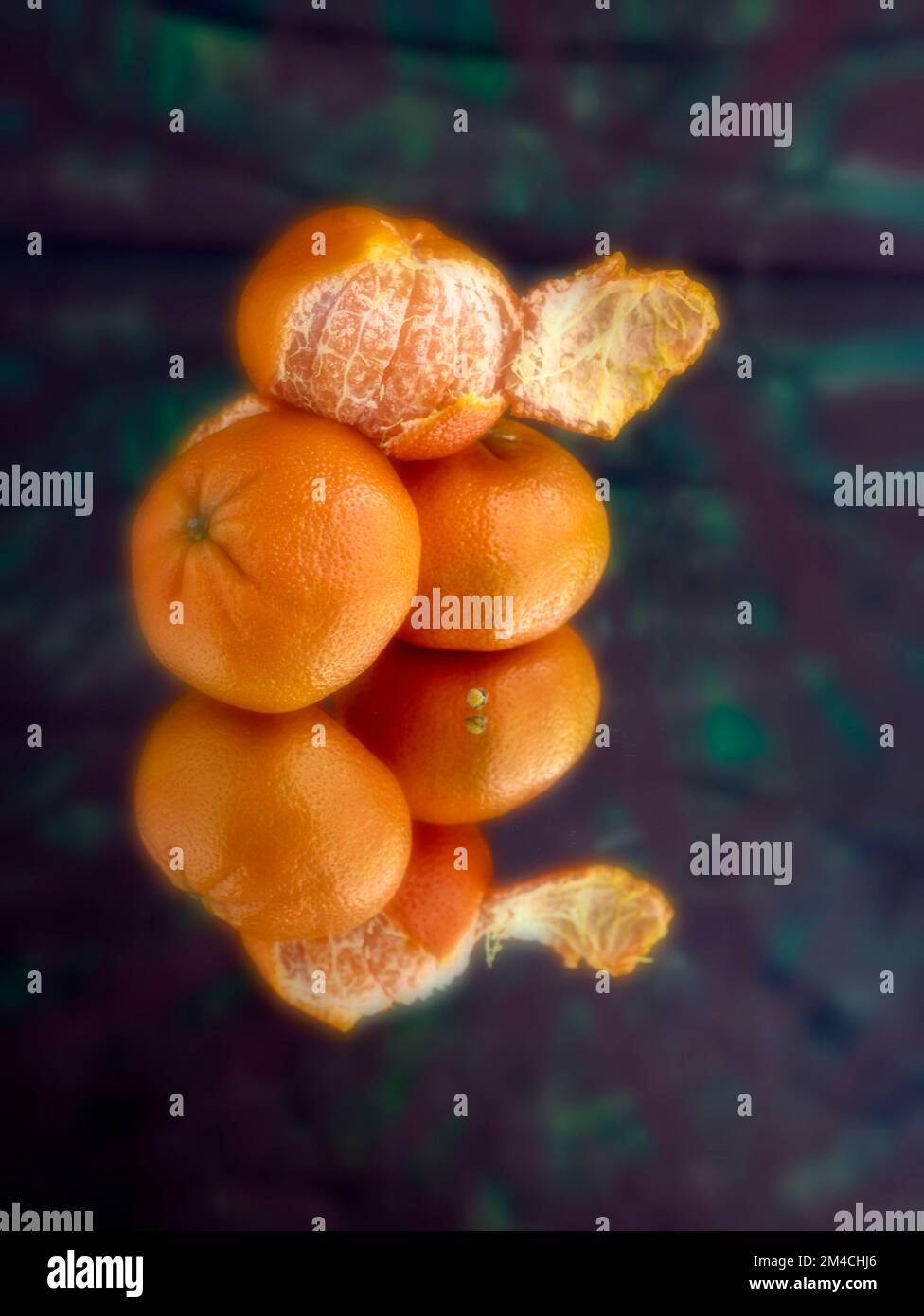 Easy peel sweet Tangerines on clean neutral background. Natural close