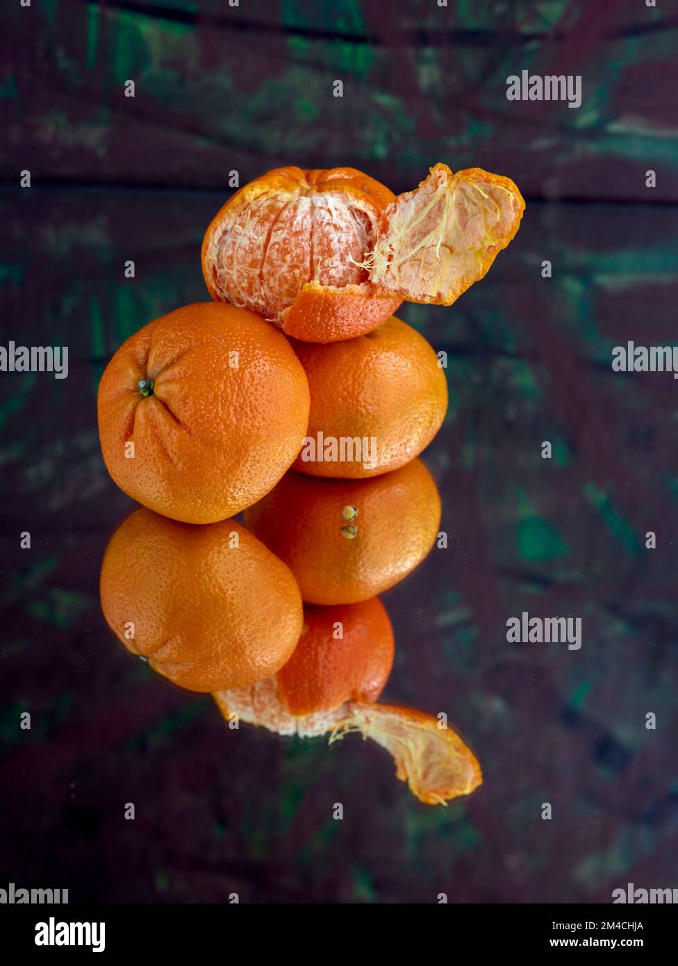 Easy peel sweet Tangerines on clean neutral background. Natural close