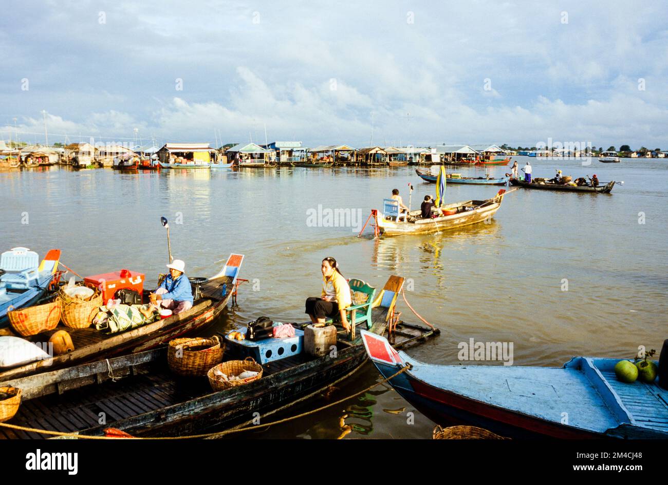 Boots are the way to carry goods across the Tonle Sap River Stock Photo