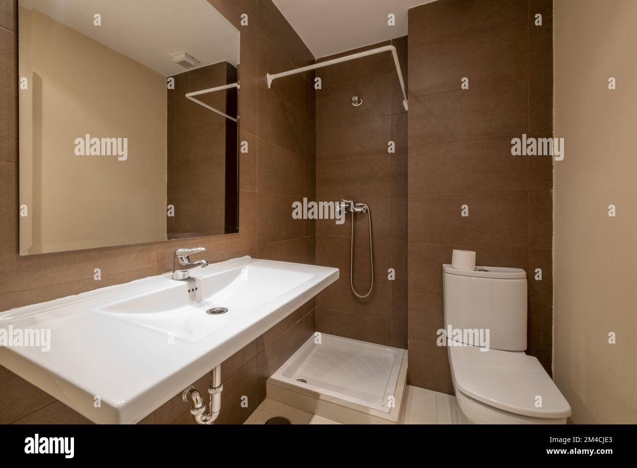 Bathroom with white porcelain sink without square beveled
