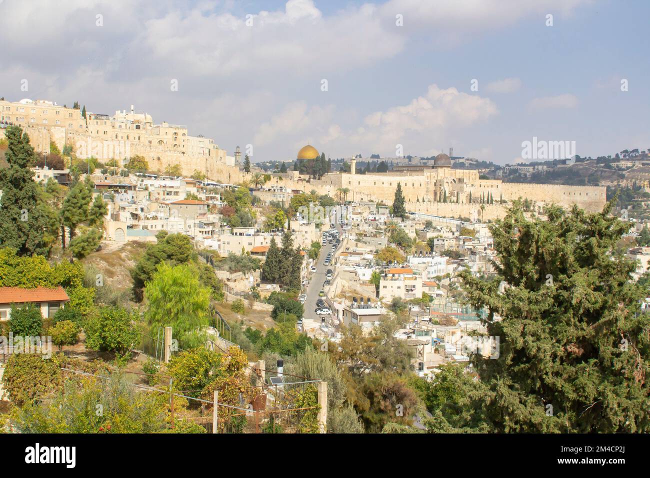 10 Nov 2022 A view of The Dome of the Rock within the ancient walled city of Jerusalem taken across the rooftops from The church of St Peter built on Stock Photo
