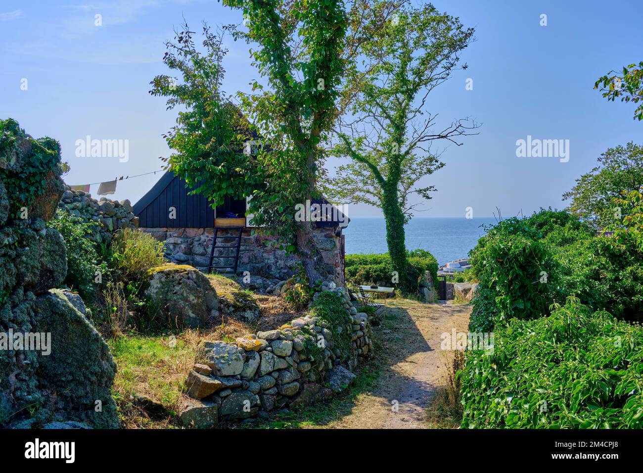 Out and about on the Ertholmen islands, still in use today, historical residential structure of little cottages on Christiansö, Ertholmene, Denmark. Stock Photo