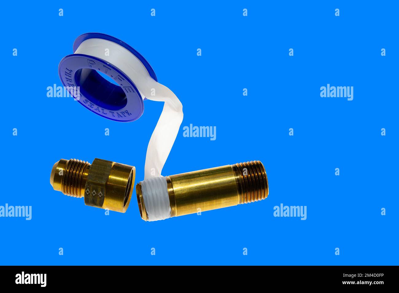 Teflon tape wrapped around the threads of the bronze pipe protects the