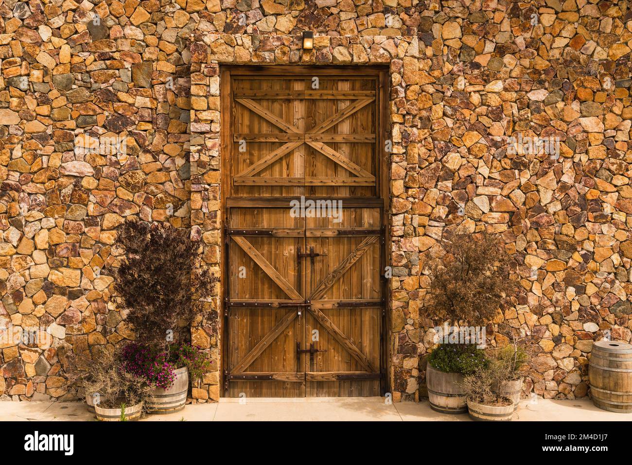 Background photo of a stone wall and wooden door Stock Photo - Alamy