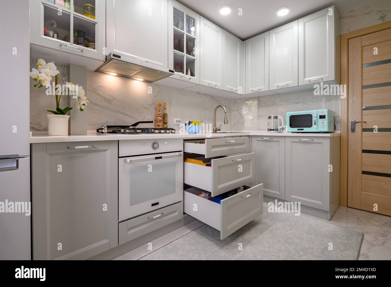 White and grey new modern well designed kitchen interior Stock Photo ...