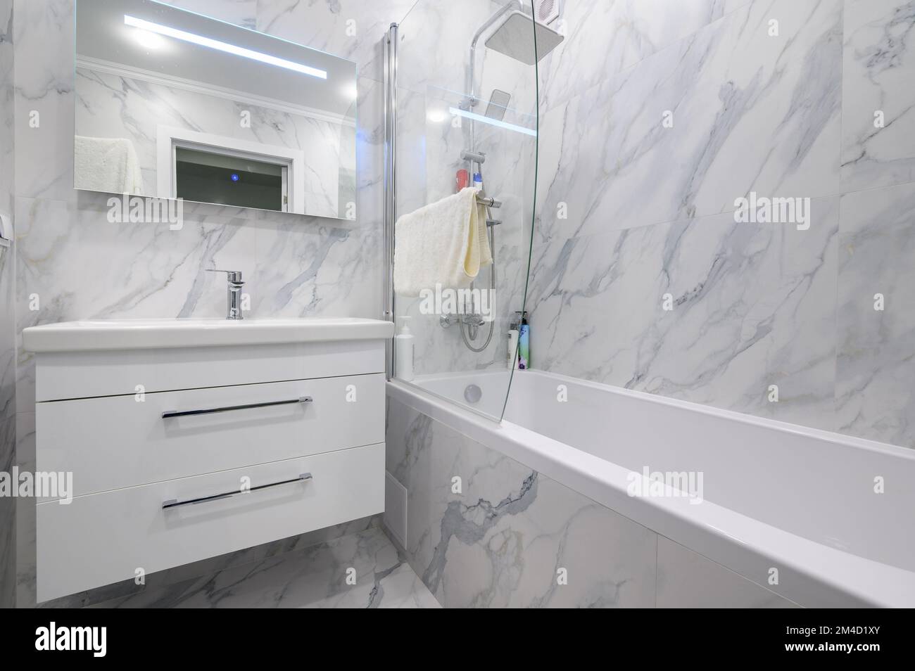 https://c8.alamy.com/comp/2M4D1XY/modern-white-marble-bathroom-interior-2M4D1XY.jpg