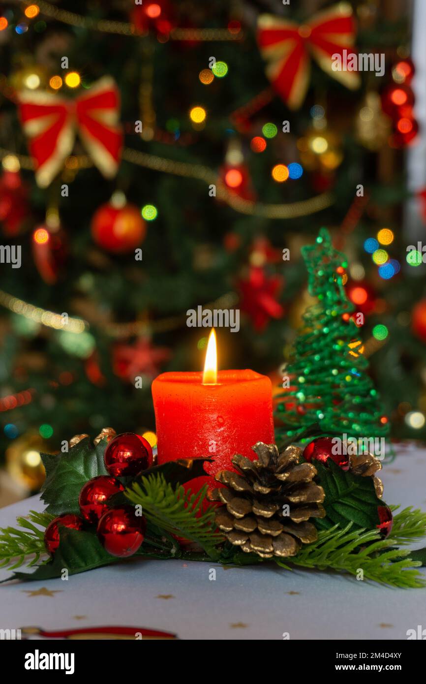 Christmas decorations on table in the living room. Christmas tree, christmas lights. Stock Photo