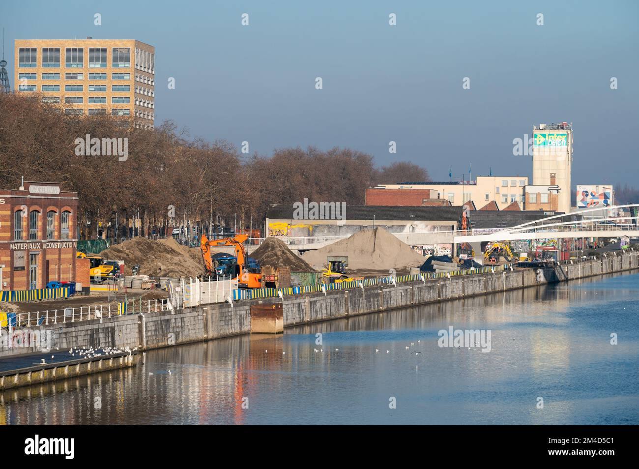 Molenbeek, Brussels Capital Region, Belgium - 12 17 2022 - Industrial activity in the construction business at the banks of the canal Stock Photo