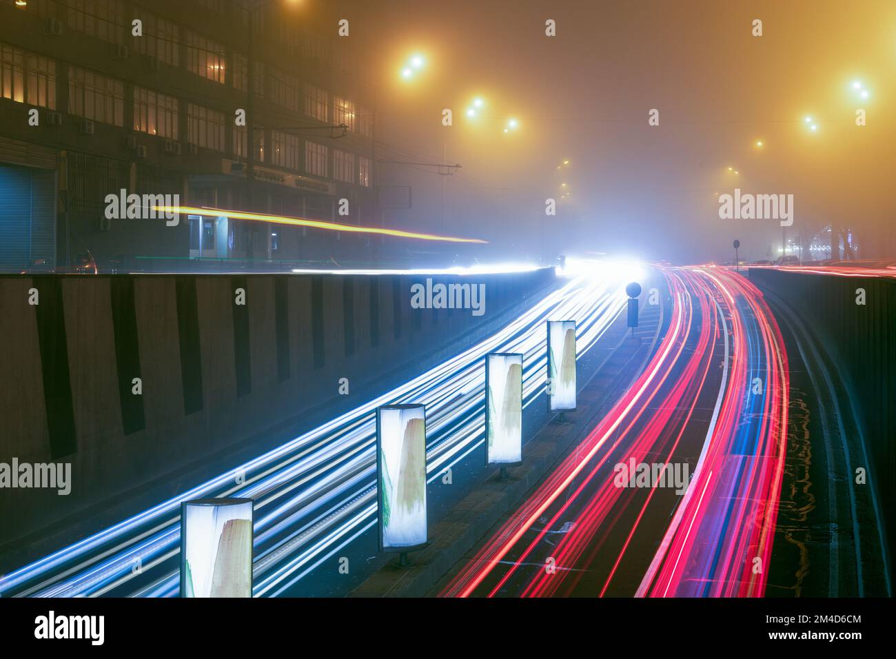 Light trails of moving cars in the city Stock Photo