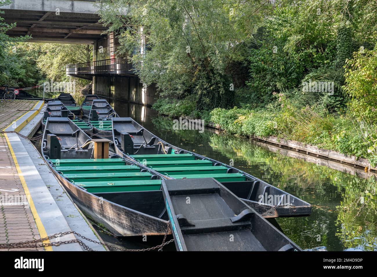 Electric tourist Boats at the The Hortillonnages - Marsh land area in the center of Amiens, Amiens, France Stock Photo