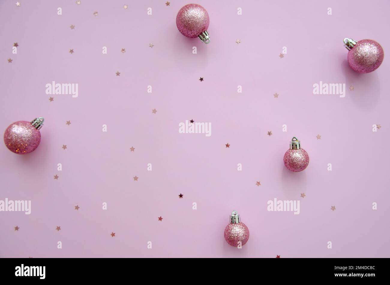 Christmas composition. Frame made of pink disco balls on pastel pink  background. Christmas, winter, new year concept. Flat lay, top view, copy  space, square Stock Photo