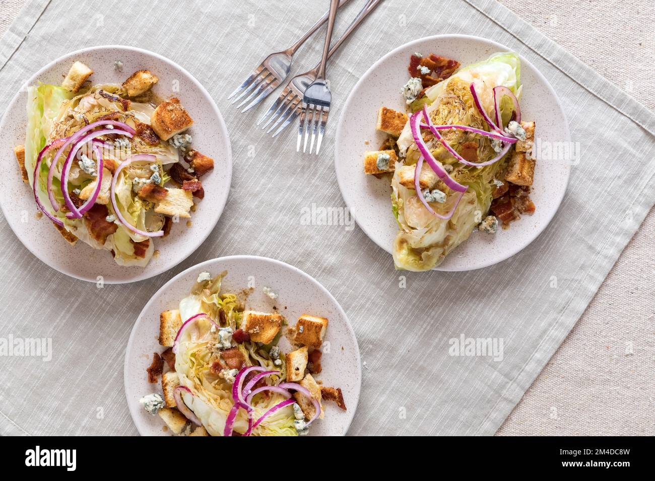 Top down view of warm wedge salads, ready for eating Stock Photo - Alamy