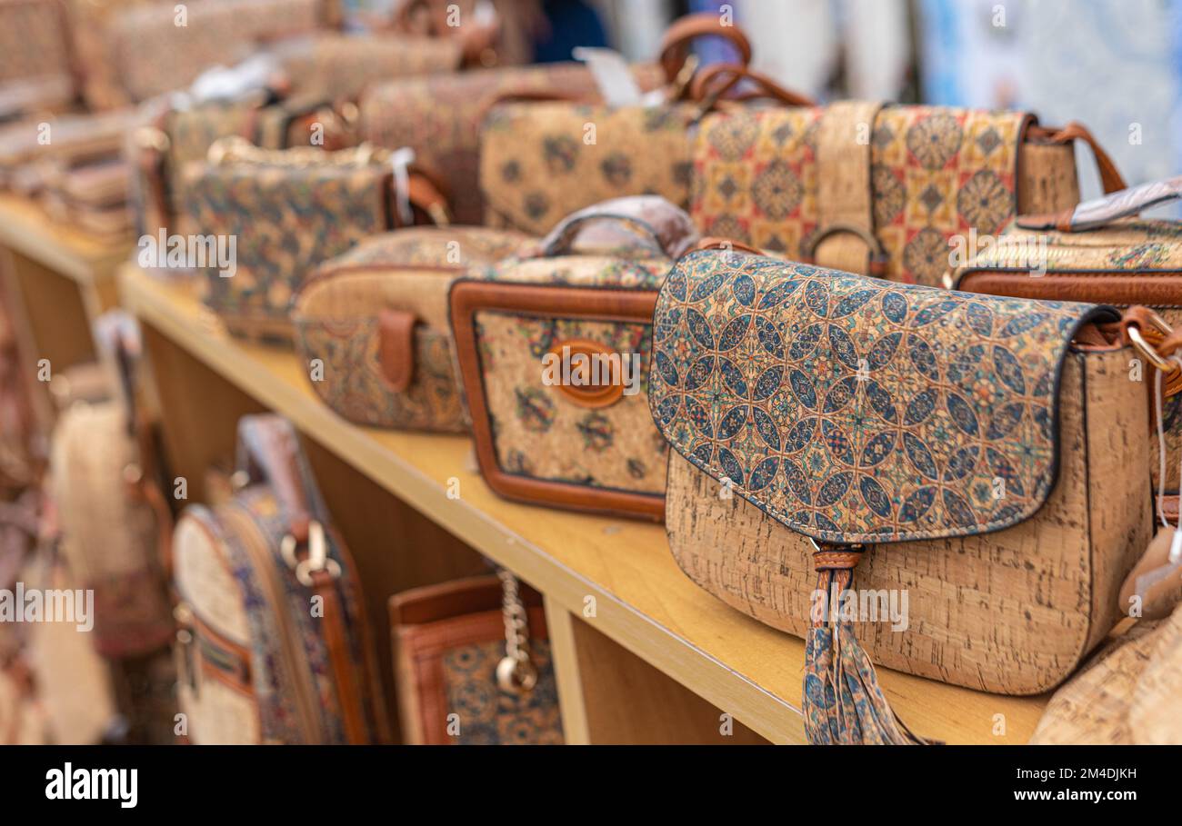 Portuguese souvenirs cork bags at the street market of Nazare, Portugal Stock Photo Alamy