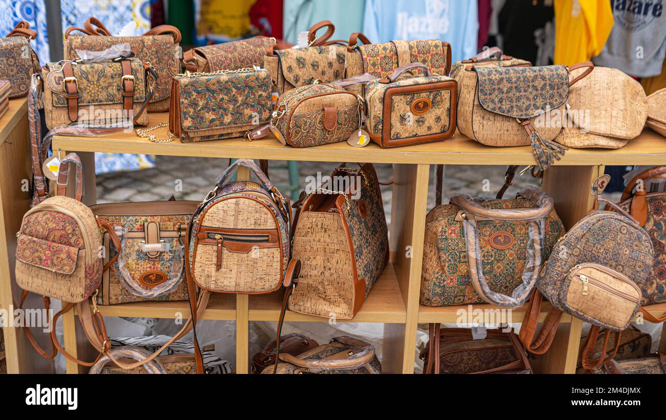 Portuguese souvenirs cork bags at the street market of Nazare, Portugal