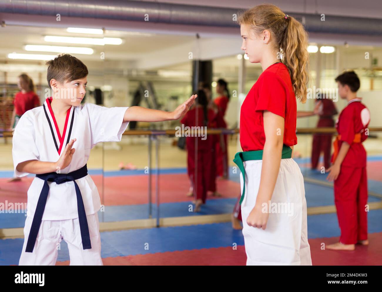 Girl and boy exercising mugendo movements Stock Photo Alamy
