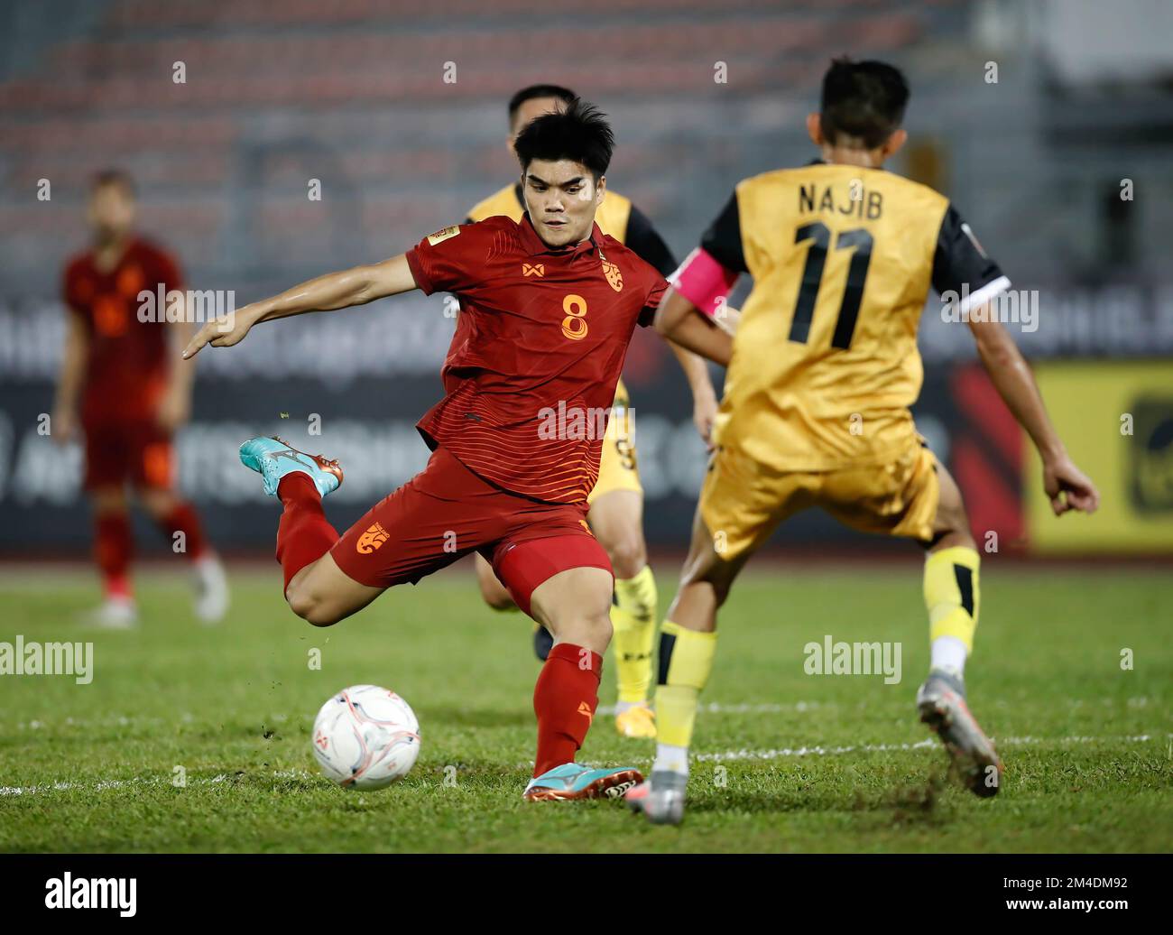 Kuala Lumpur, Malaysia. 20th Dec, 2022. Peeradol Chamrasamee of Thailand (L) and Najib Tarif of Brunei in action during the AFF Mitsubishi Electric Cup 2022 match between Thailand and Brunei at Kuala Lumpur Football Stadium Final score; Thailand 5:0 Brunei Credit: SOPA Images Limited/Alamy Live News Stock Photo