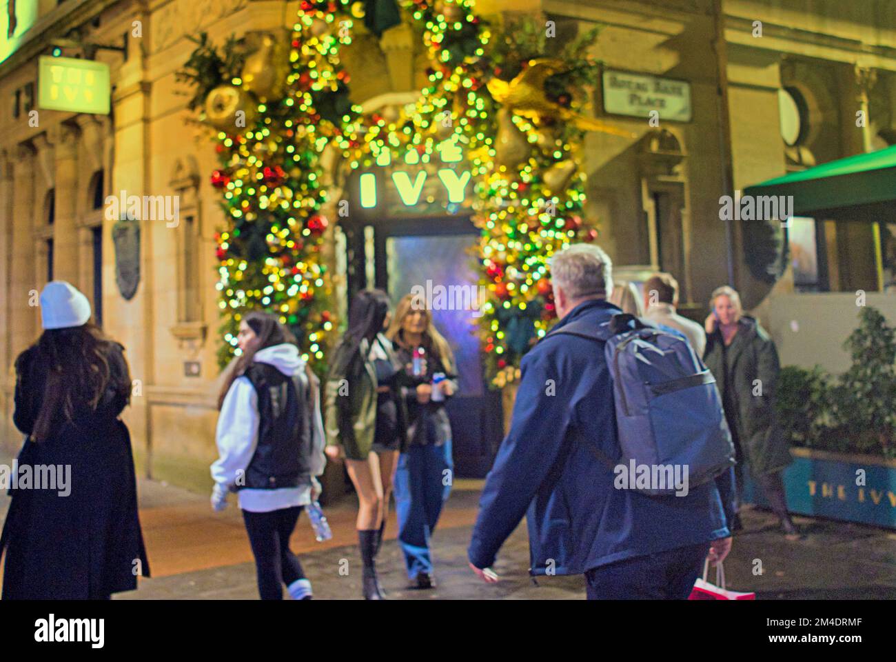 Glasgow, Scotland, UK 20th December, 2022. the ivy restaurant 106 Buchanan St, Glasgow G1 2NB Christmas shopping  and fairs flavoured the night streets of the city.  Buchanan street, the style mile shopping-capital of Scotland.  Credit Gerard Ferry/Alamy Live News Stock Photo