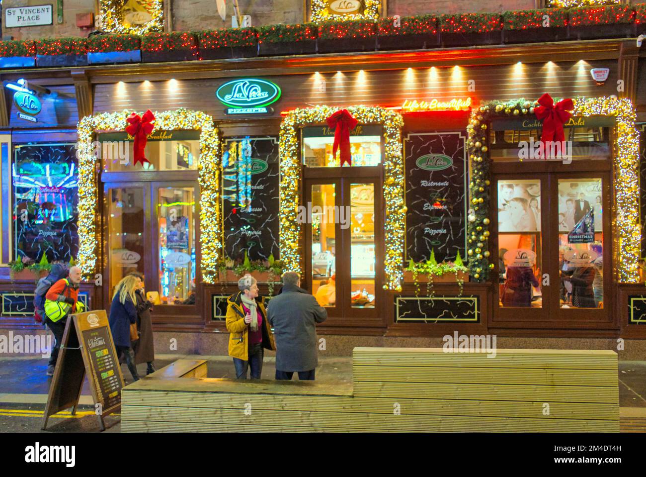Glasgow, Scotland, UK 20th December, 2022. La Vita restaurant famous Christmas decorations  Christmas shopping  and fairs flavoured the night streets of the city. Credit Gerard Ferry/Alamy Live News Stock Photo