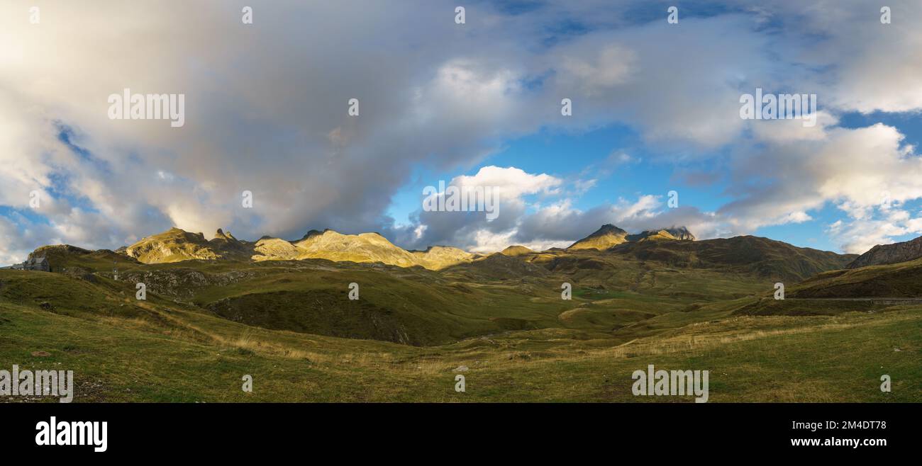 Panorama of Pyrenees Mountains at the french and spanish border in golden morning sunlight, Col du Pourtalet, Nouvelle-Aquitaine France Stock Photo