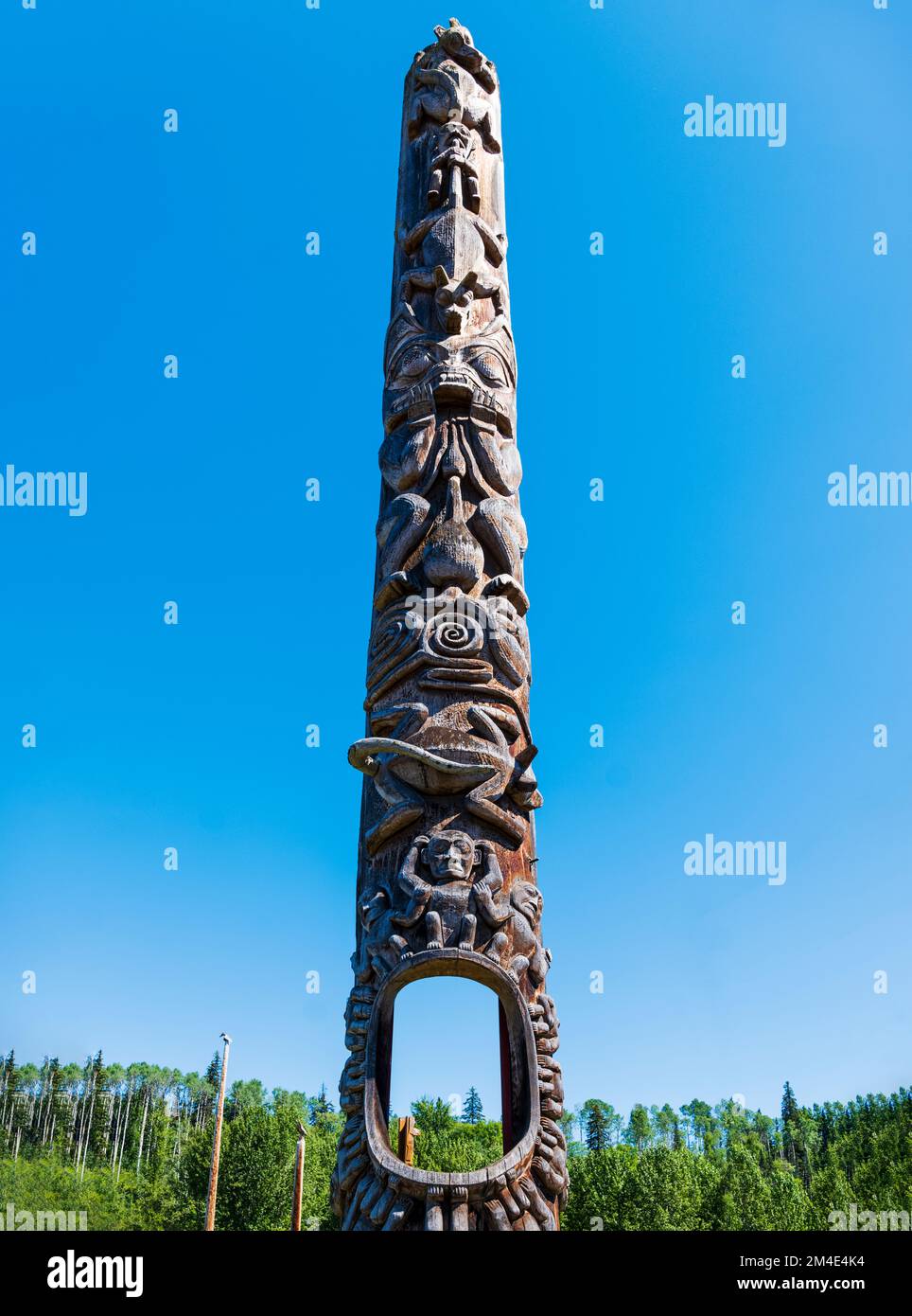 Hand carved cedar totem poles; Gitanyow - Kitwancool Historic Village ...