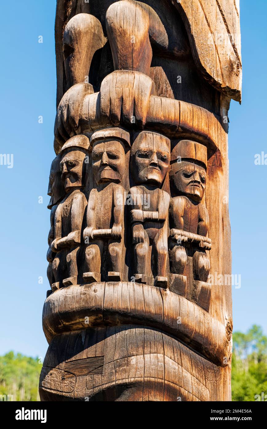 Hand carved cedar totem poles; Gitanyow - Kitwancool Historic Village & Interpretive Center; Gitanyow; British Columbia; Canada Stock Photo