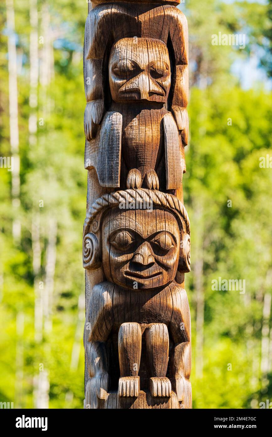 Hand carved cedar totem poles; Gitanyow - Kitwancool Historic Village ...