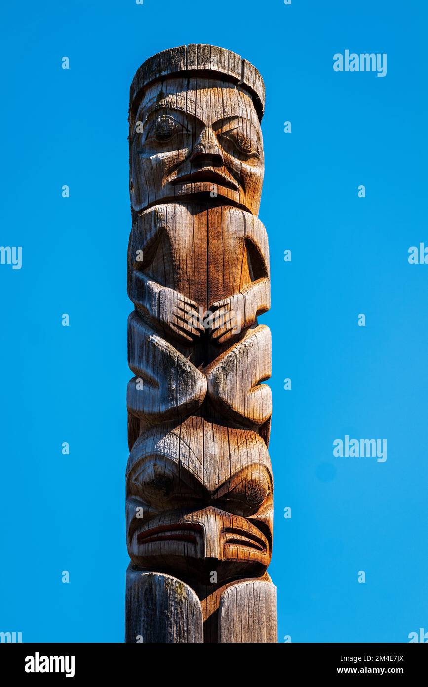 Hand carved cedar totem poles; Gitanyow - Kitwancool Historic Village & Interpretive Center; Gitanyow; British Columbia; Canada Stock Photo