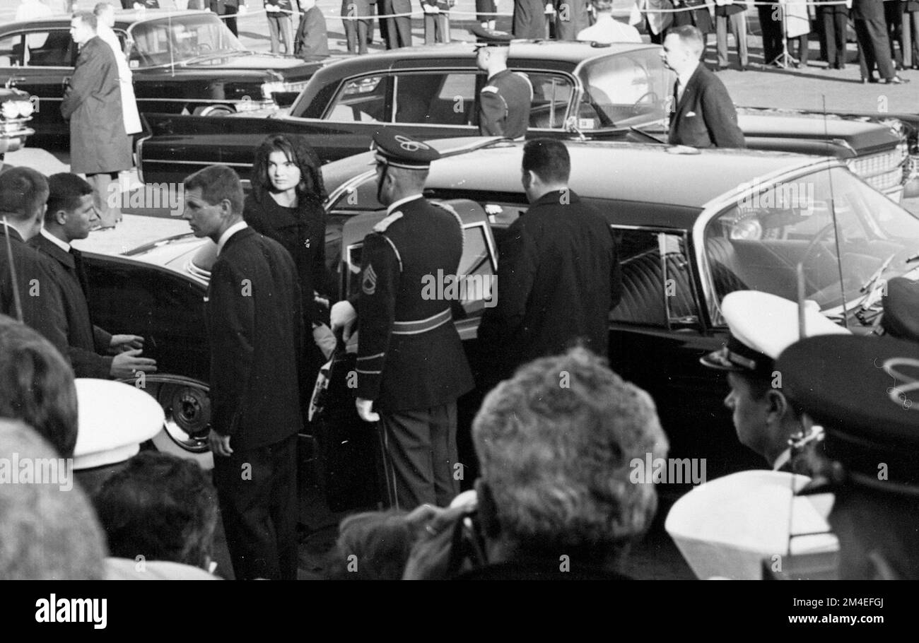 Photograph of Jacqueline Kennedy and Robert Kennedy about to enter a limousine, during funeral services for President John F. Kennedy. Stock Photo