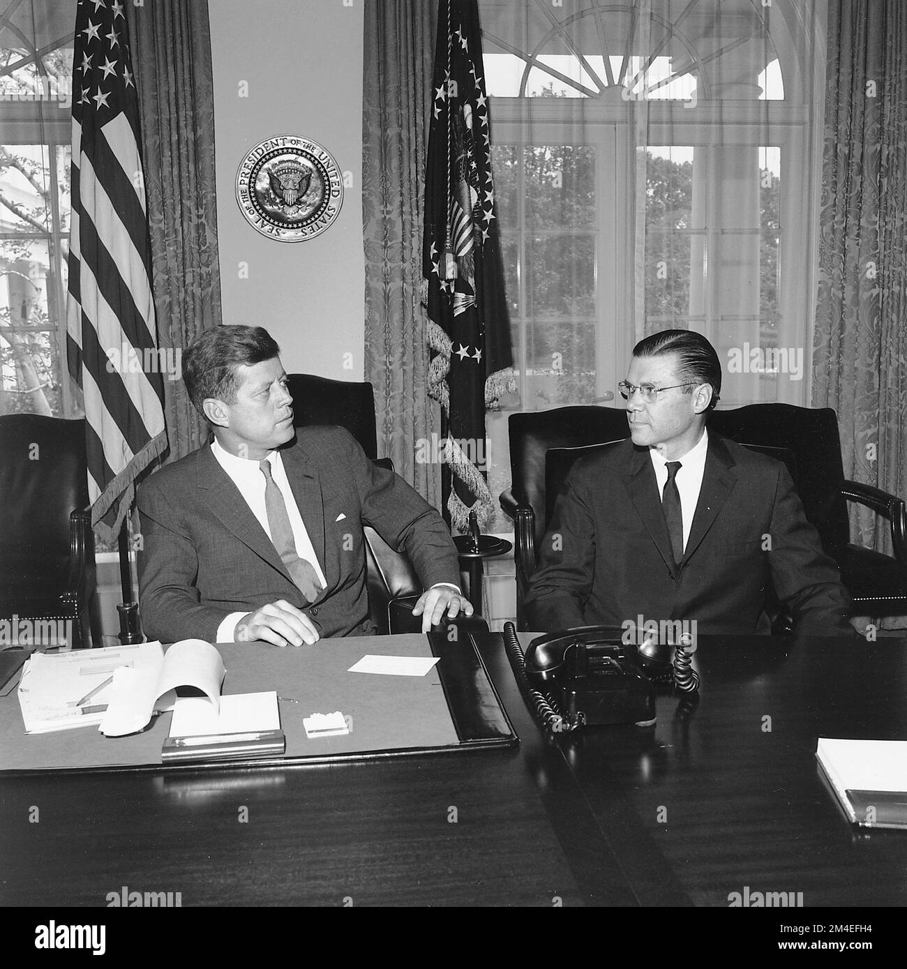 US President John F Kennedy and Secretary of Defense Robert McNamara, 1962 Stock Photo
