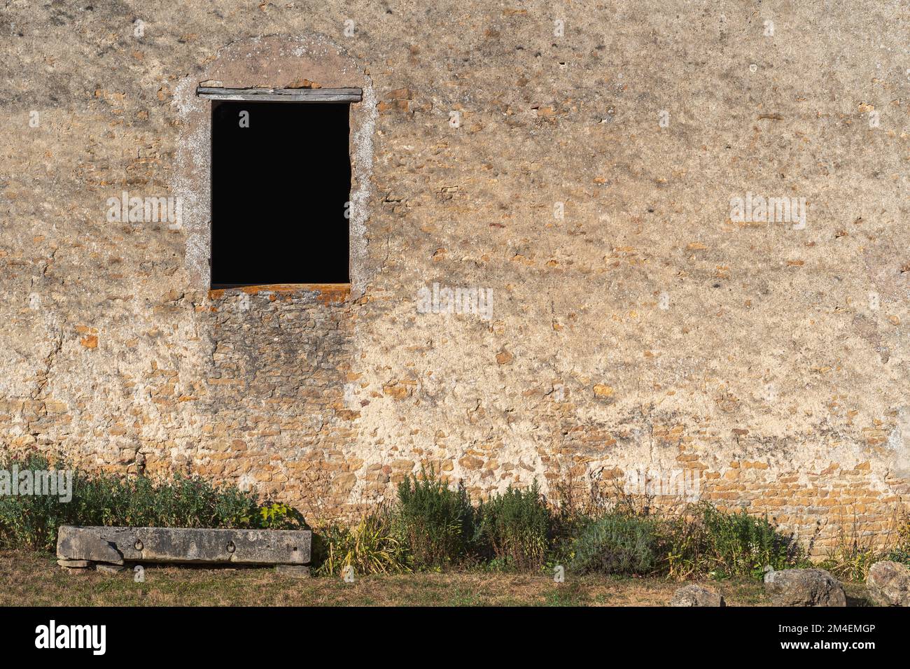 An abandoned brick buildings with window opening Stock Photo - Alamy