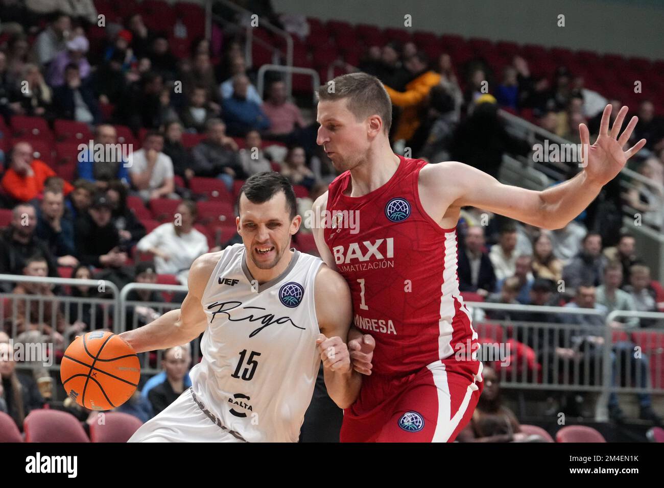 Riga, Latvia. 20th Dec, 2022. Artis Ate (L) of VEF Riga vies with Adam  Vaczynski of Basquet Manresa during the group F match at Europe Basketball  Champions League between VEF Riga and