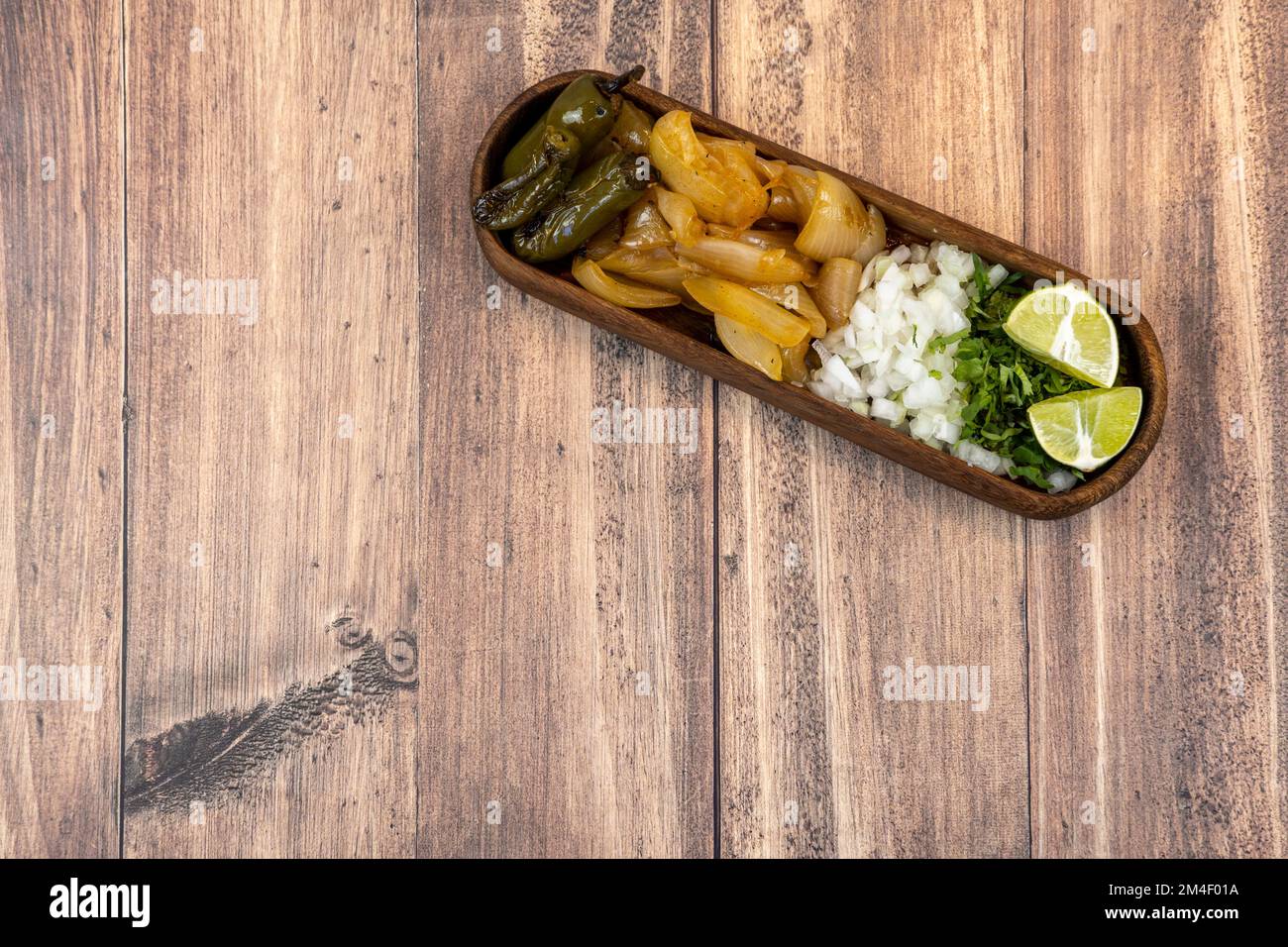 chile and roasted onion, chopped red onion with cilantro, torta ahogada de res Stock Photo Alamy