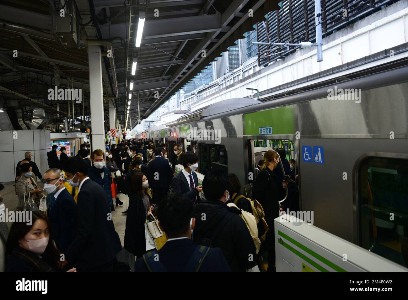 Japanese passengers on the JR Yamanote line in Tokyo, Japan Stock Photo