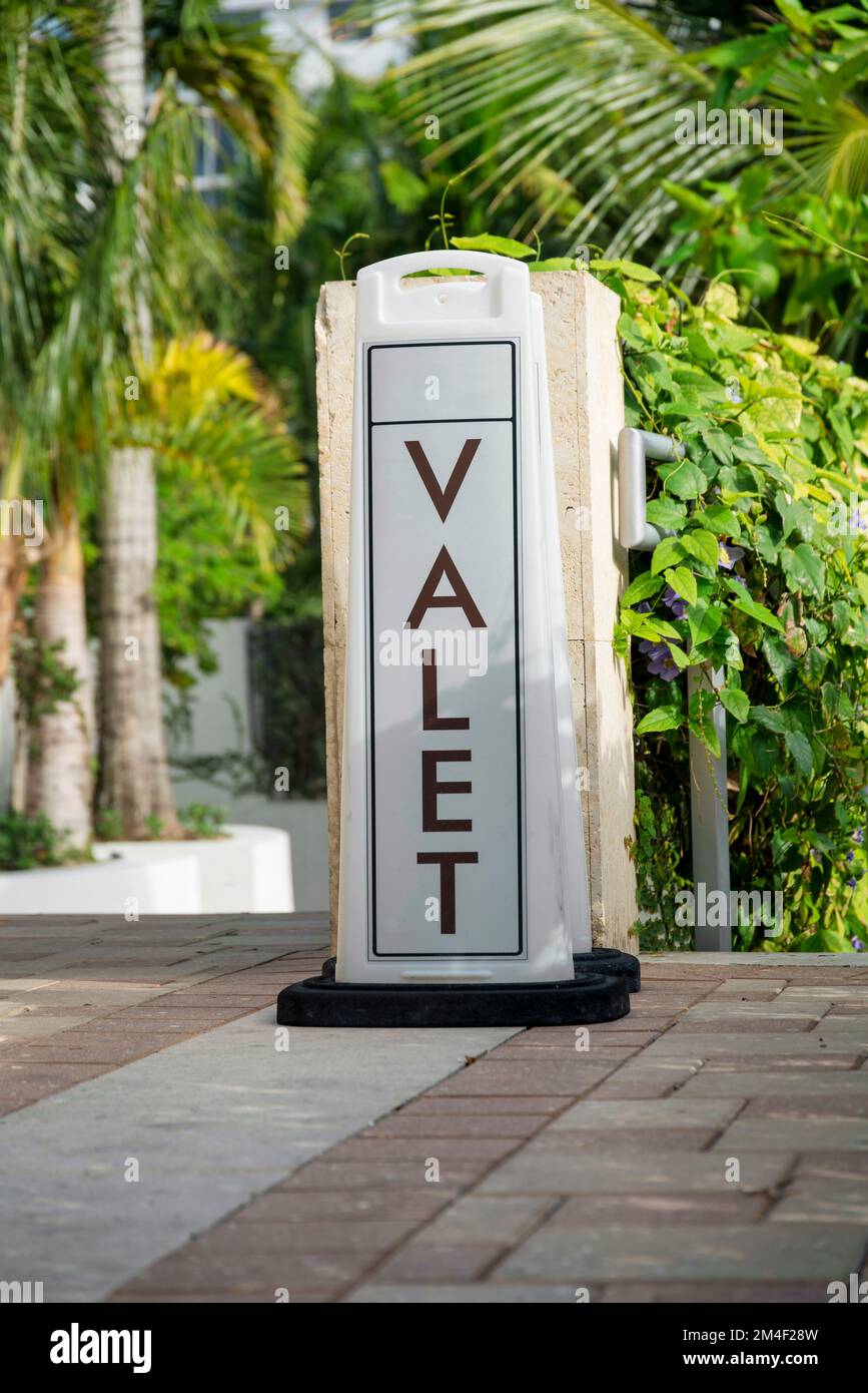 Floormounted Valet signage on a bricks pavement Miami, Florida. Valet