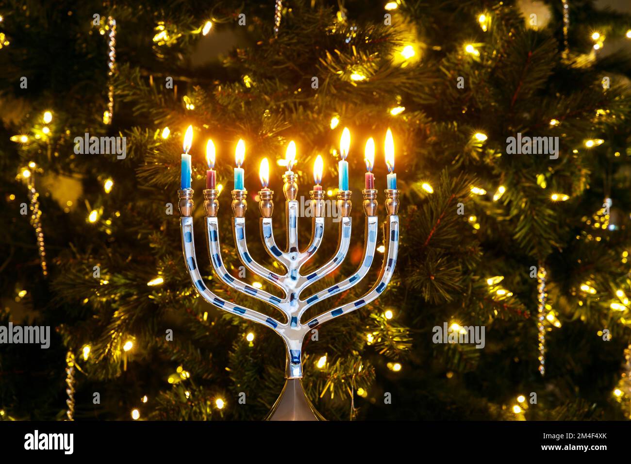 During Hanukkah, nine candle menorah is lit Stock Photo Alamy