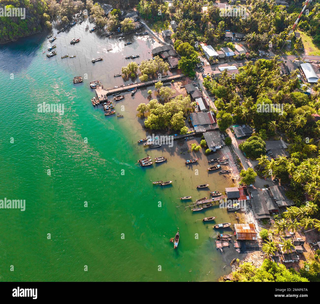 Aerial view of Bo Chet Luk port Harbour with long tail boats, in Satun