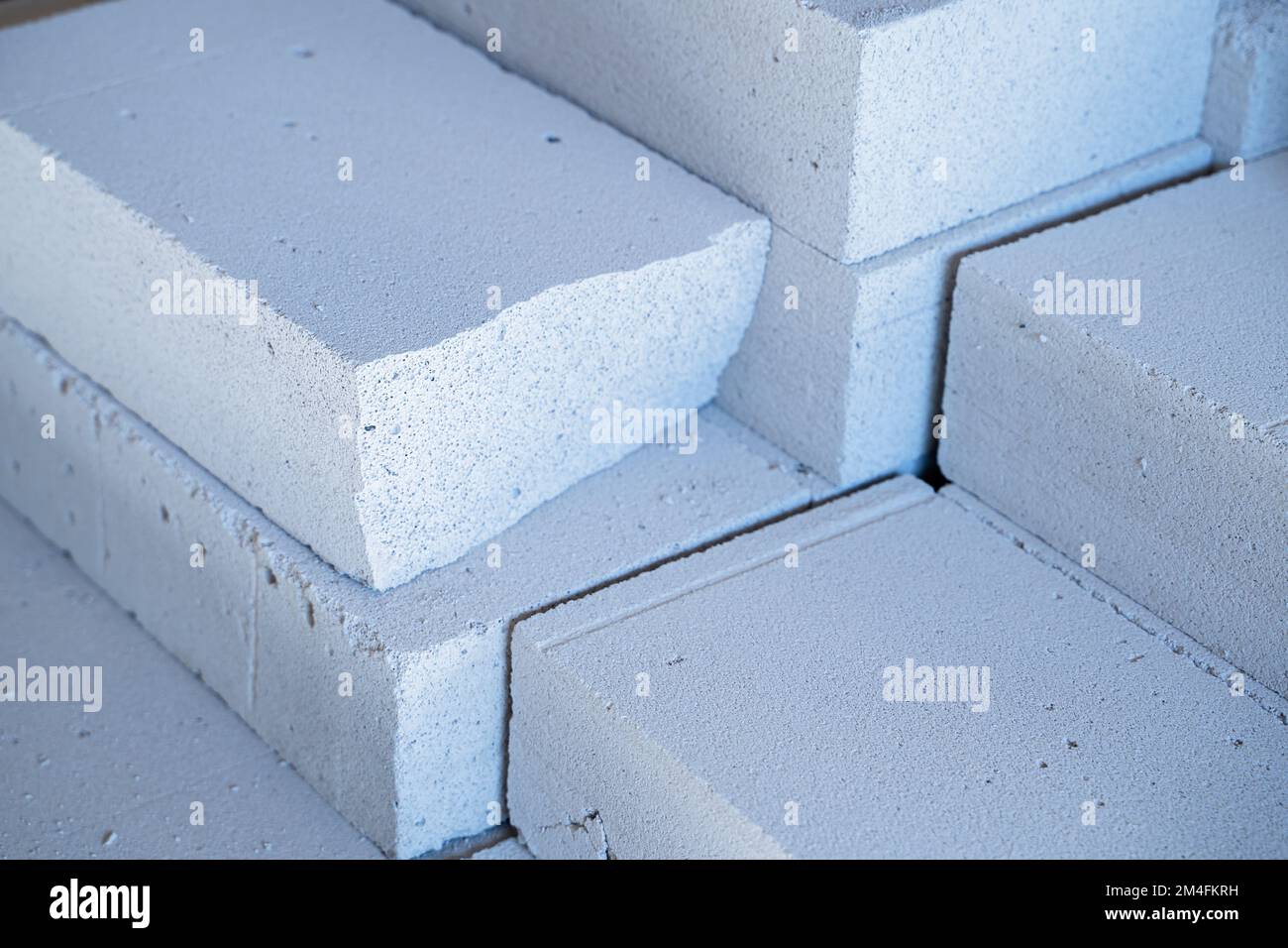 Poorquality brittle aerated concrete closeup at the place of spalling