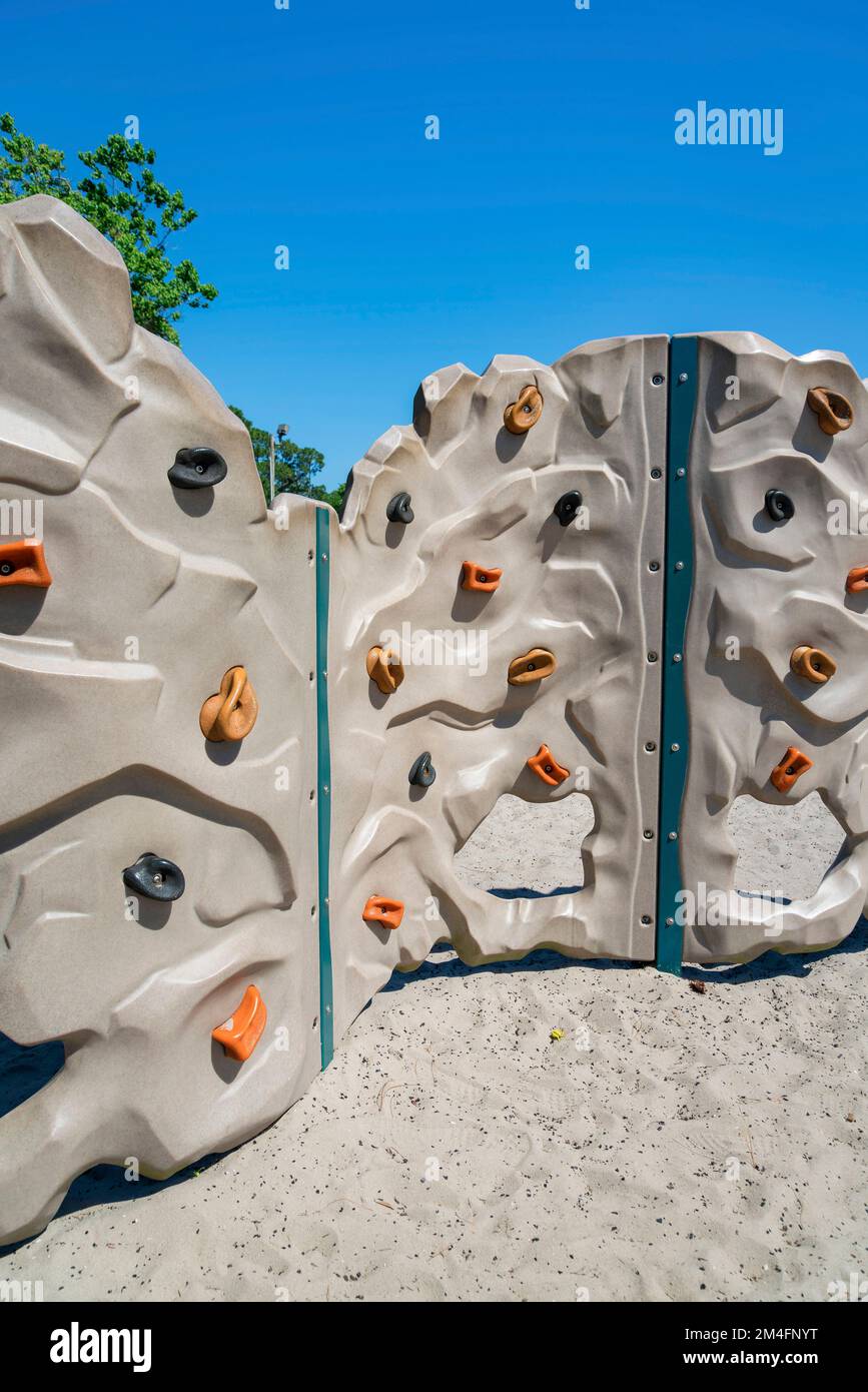 Destin, Florida Outdoor plastic kids wall climbing. Gray wall climbing with colorful fake