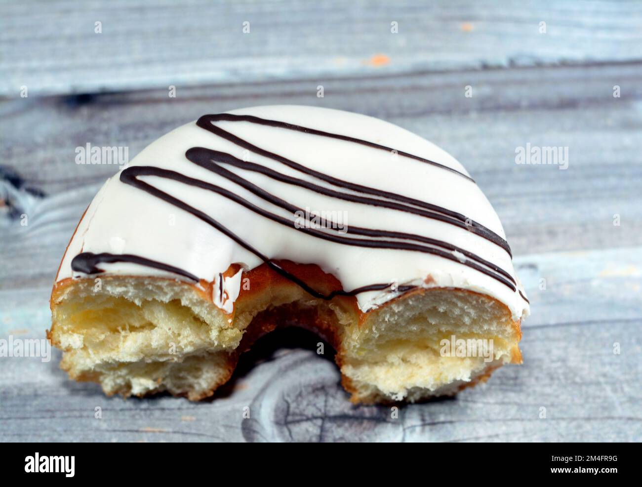 White chocolate ring donut with brown chocolate sauce, A glazed, yeast