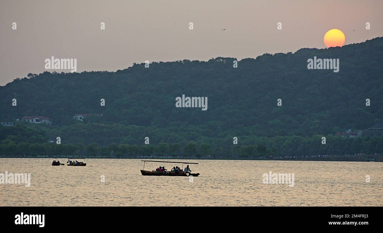 Sunset at the West Lake in Hangzhou - China Stock Photo