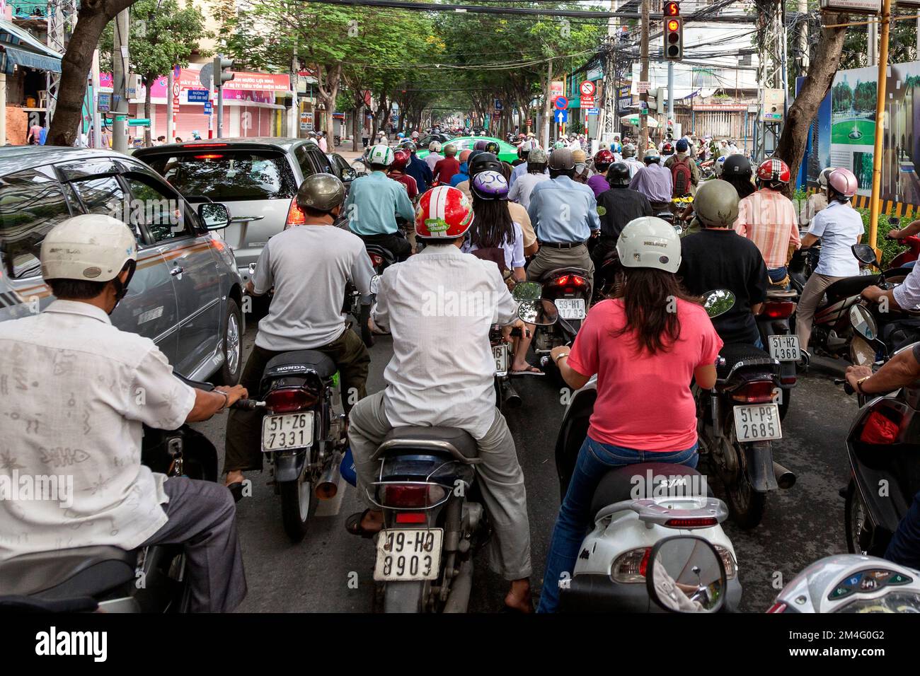 Motorcycle in Saigon traffic, Vietnam Stock Photo