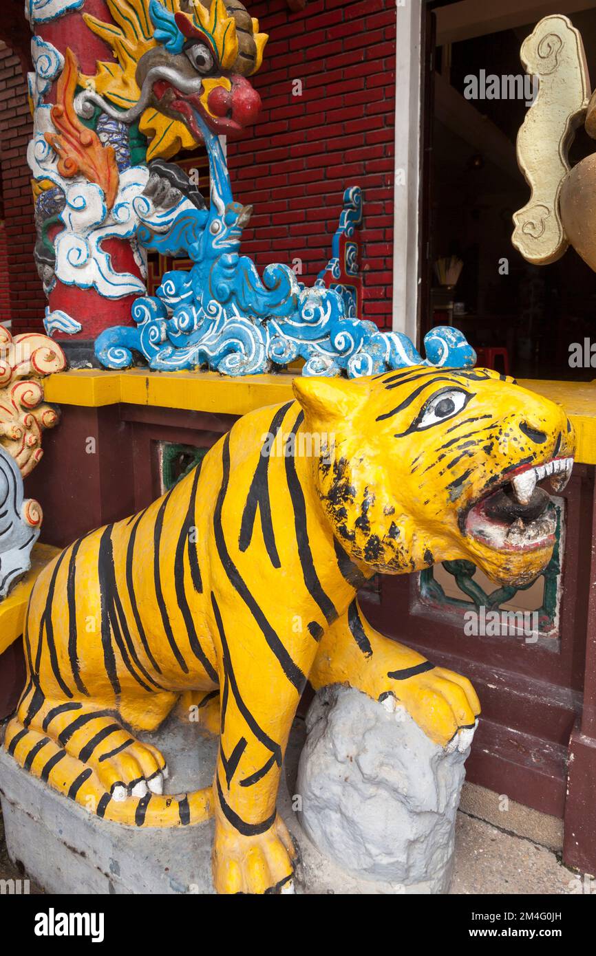 Tiger statue and symbolic carvings, Tran Hung Dao temple, Ho Chi Minh
