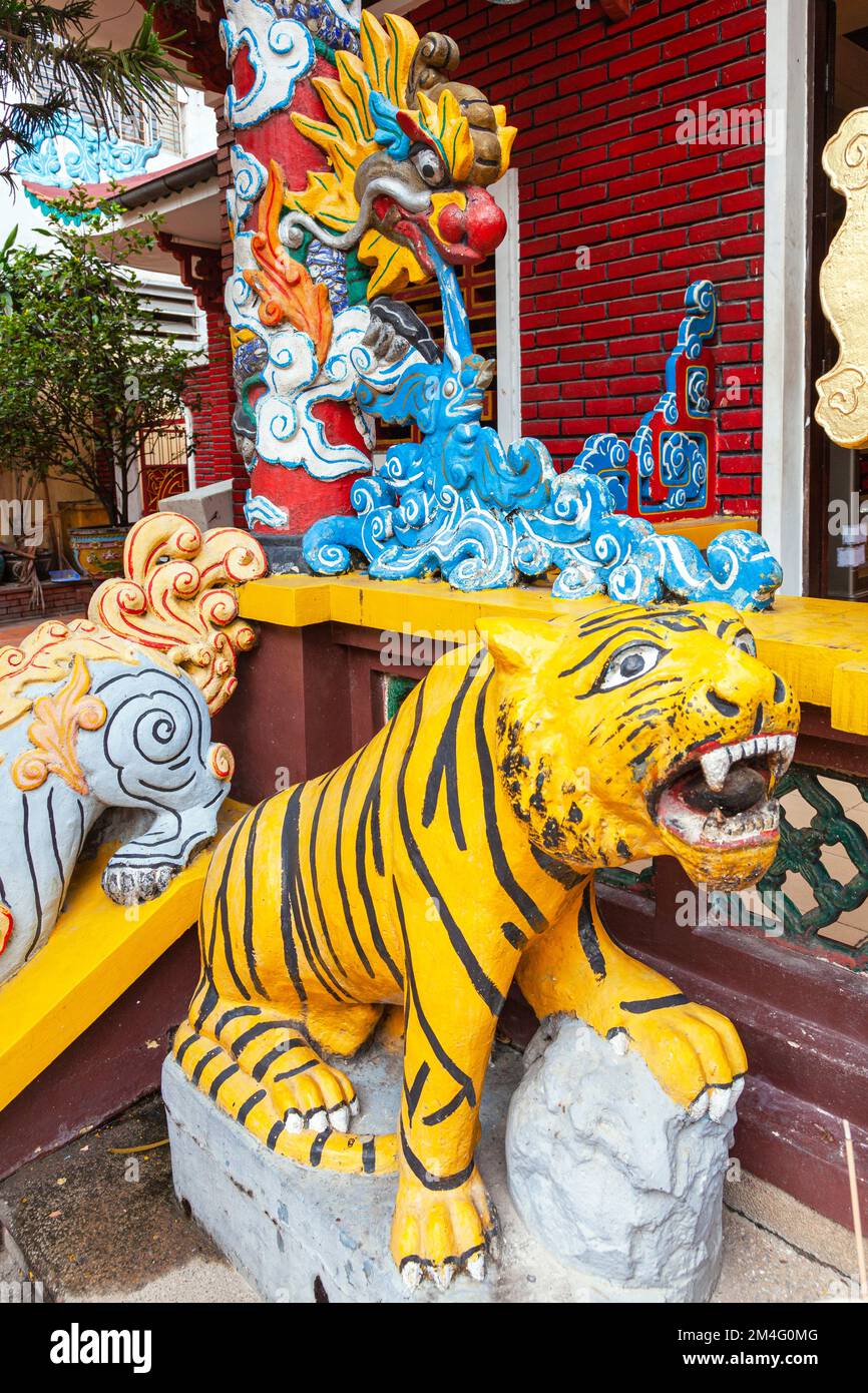 Tiger statue and symbolic carvings, Tran Hung Dao temple, Ho Chi Minh