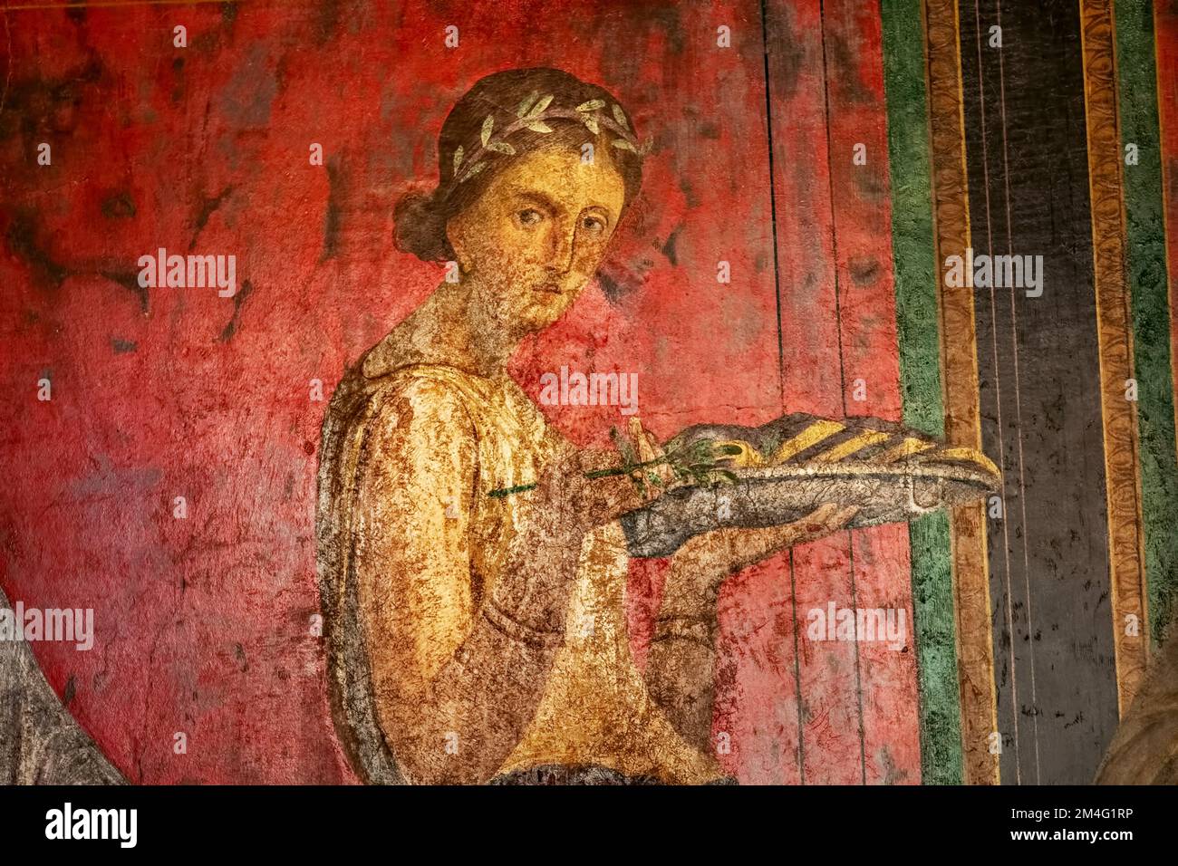 Ancient Roman fresco in Pompeii showing a detail of the mystery cult of Dionysus Stock Photo