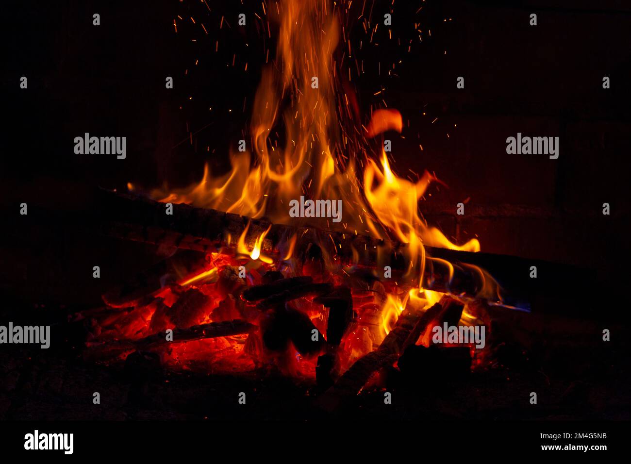 detailed close-up of wooden planks burning in a bonfire Stock Photo