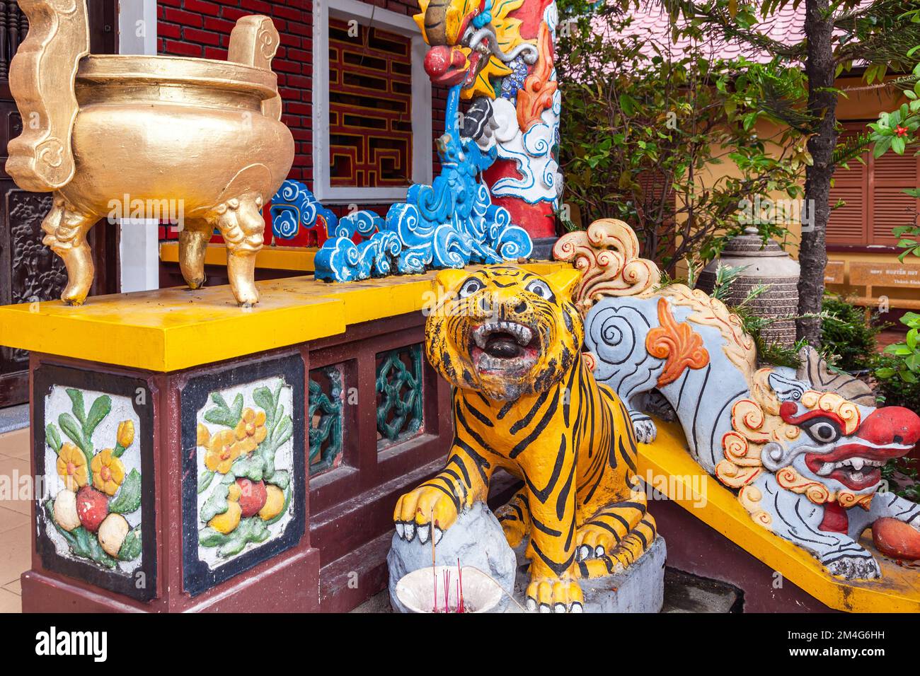 Tiger Statue And Symbolic Carvings Tran Hung Dao Temple Ho Chi Minh City Vietnam Stock Photo